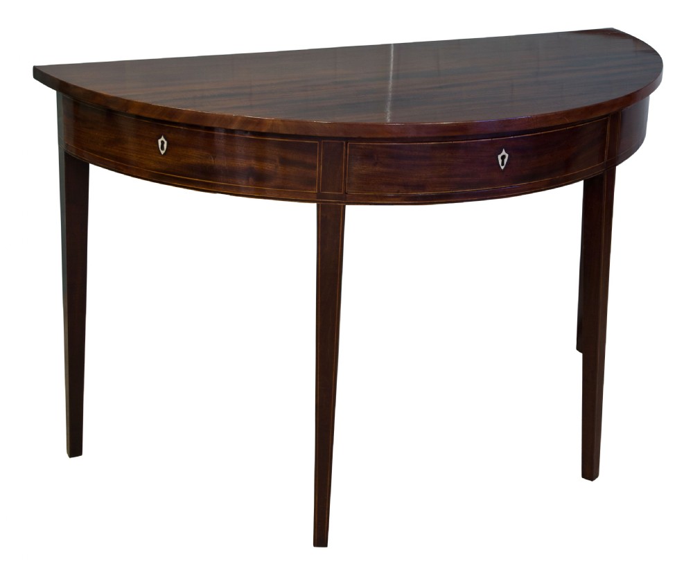 A fine pair of George III Mahogany demi lune side tables View II