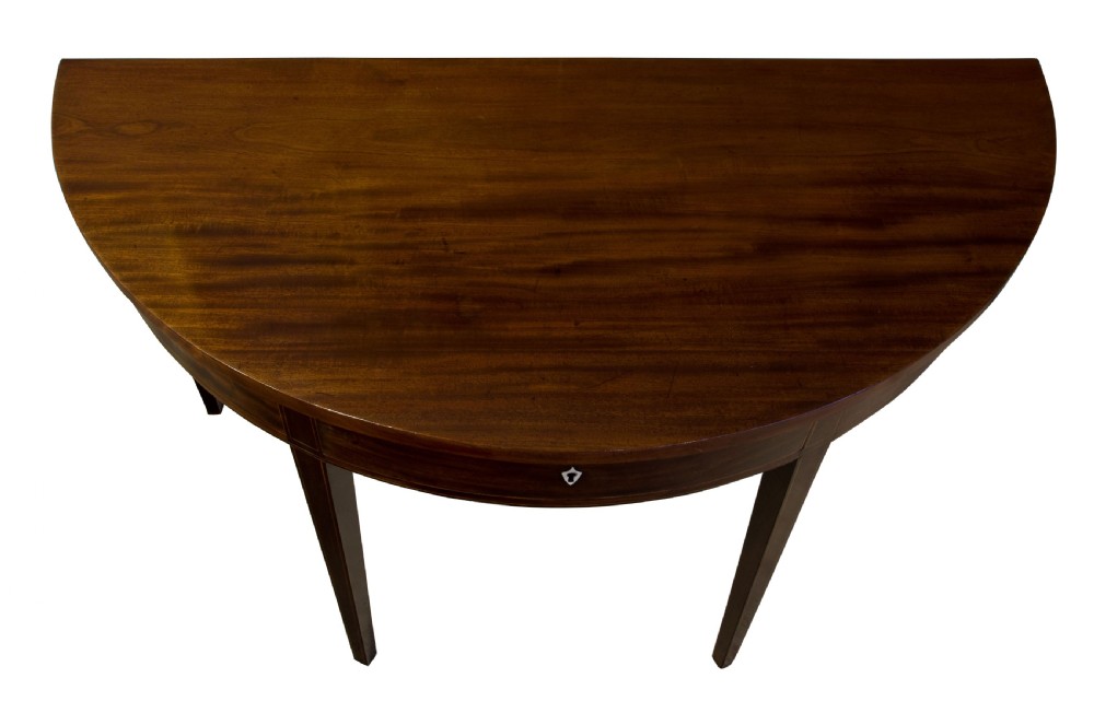 A fine pair of George III Mahogany demi lune side tables View V