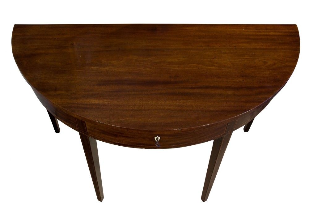 A fine pair of George III Mahogany demi lune side tables View VI