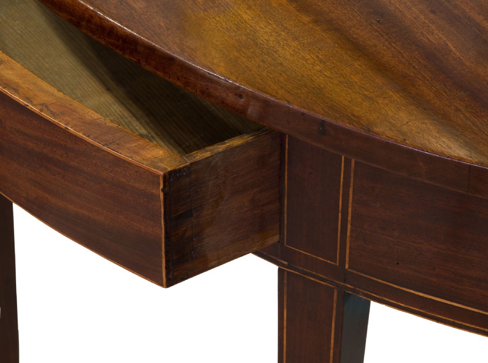 A fine pair of George III Mahogany demi lune side tables View VIII
