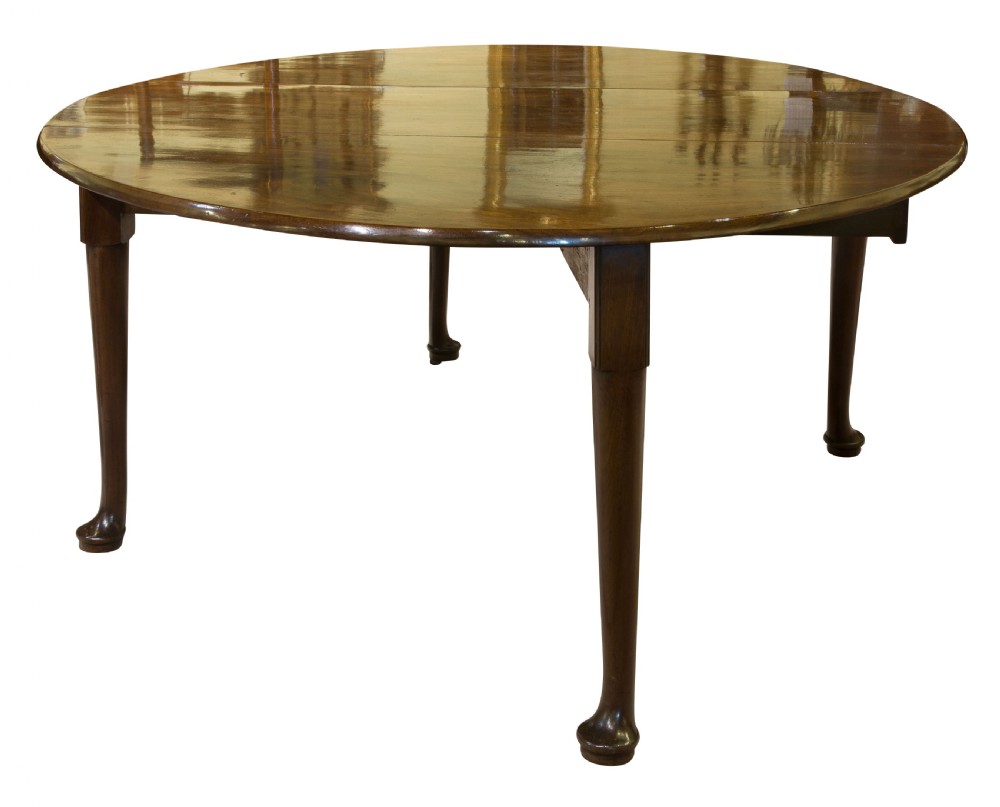 A very Fine Early Georgian Cuban Mahogany dropleaf dining table View IV