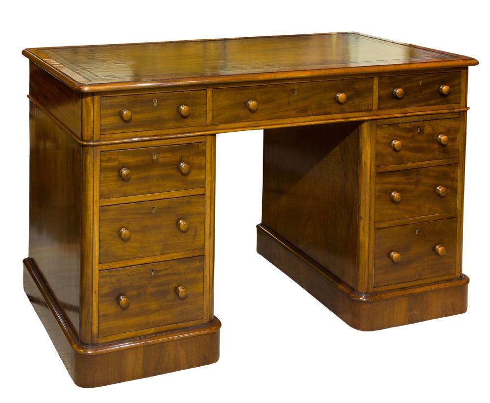 An Edwardian Mahogany Pedestal desk