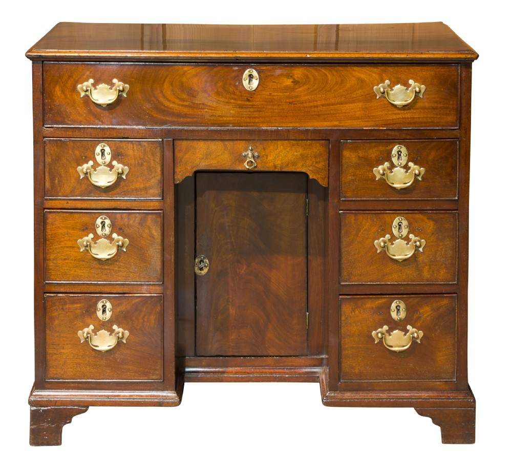A George III small kneehole desk of six drawers View IV