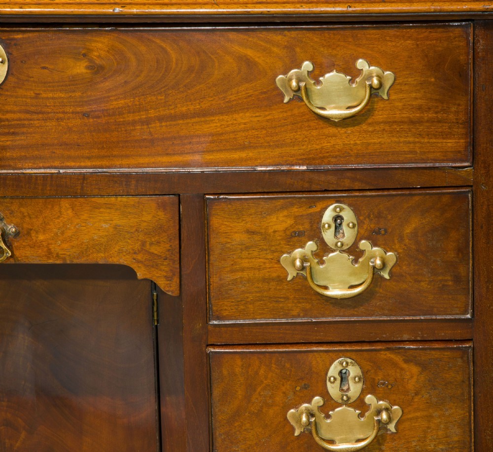 A George III small kneehole desk of six drawers View VI