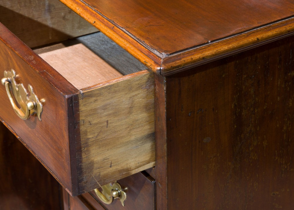 A George III small kneehole desk of six drawers View VII