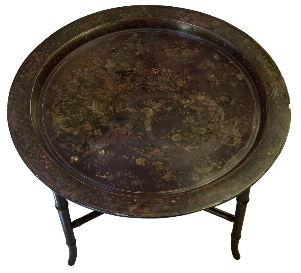 A circular black japanned occasional table featuring a raised tray top and three faux-bamboo turned legs joined by a central stretcher. View III