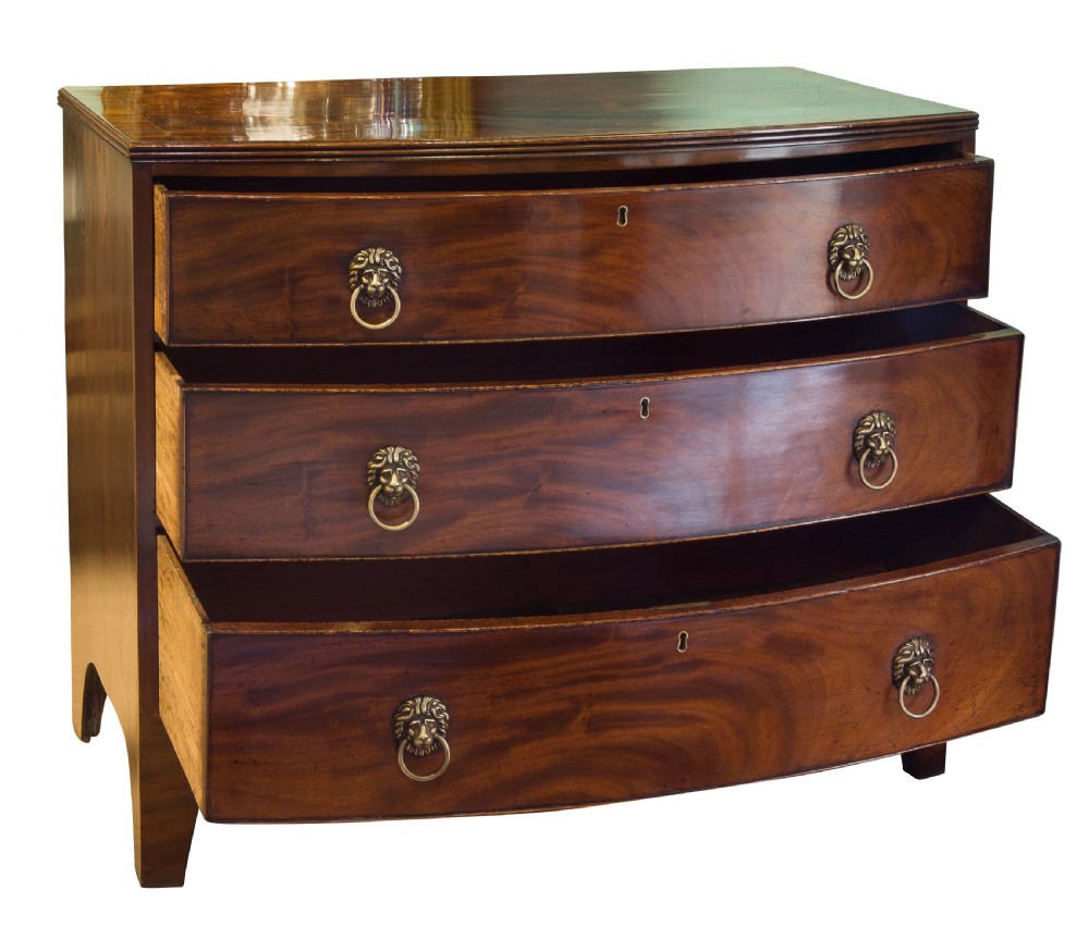 Late Regency bowfront chest of drawers c1820 View II