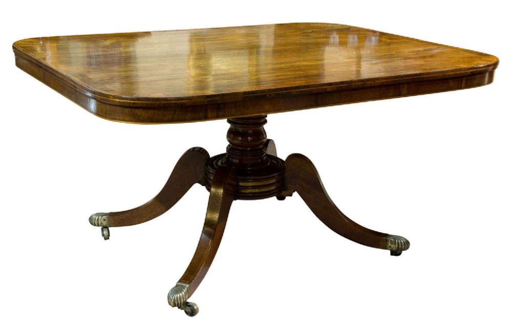 A cross banded rosewood breakfast table circa 1810