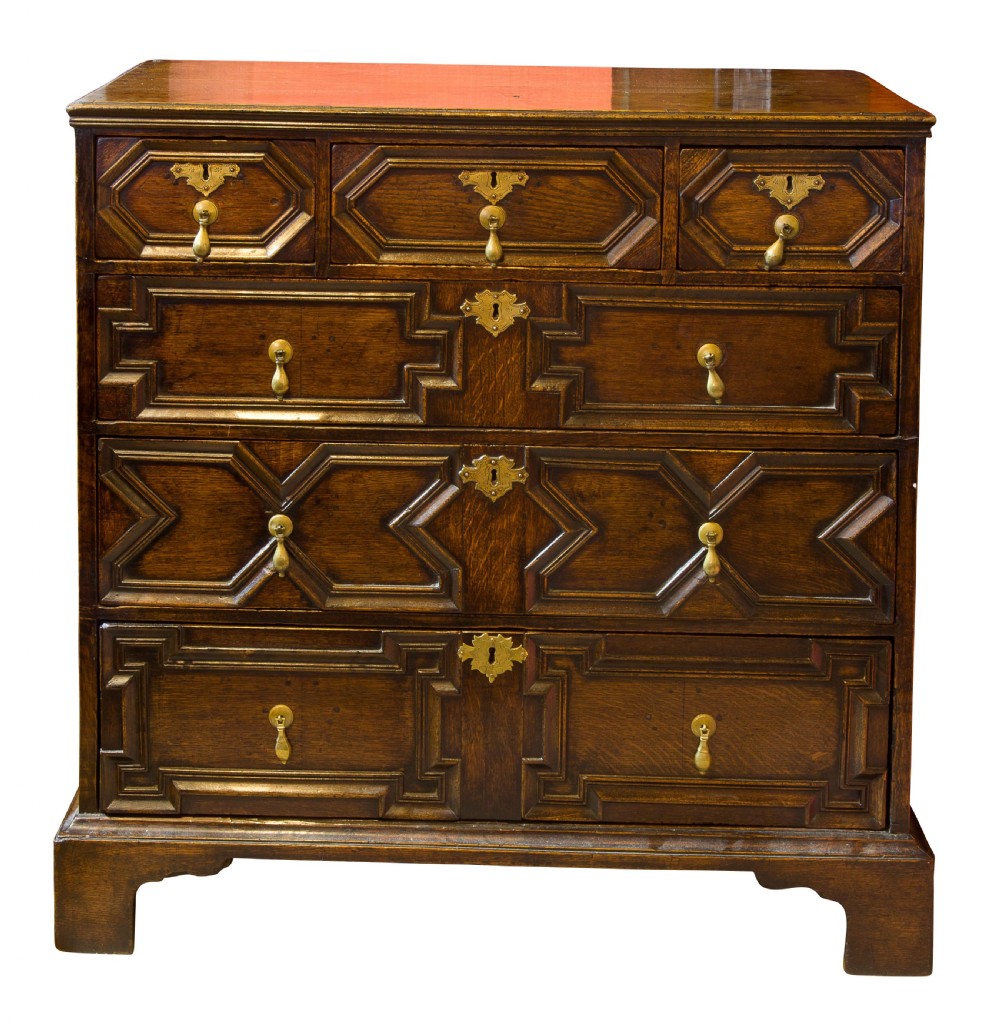 A Queen Anne period oak moulded front chest View III