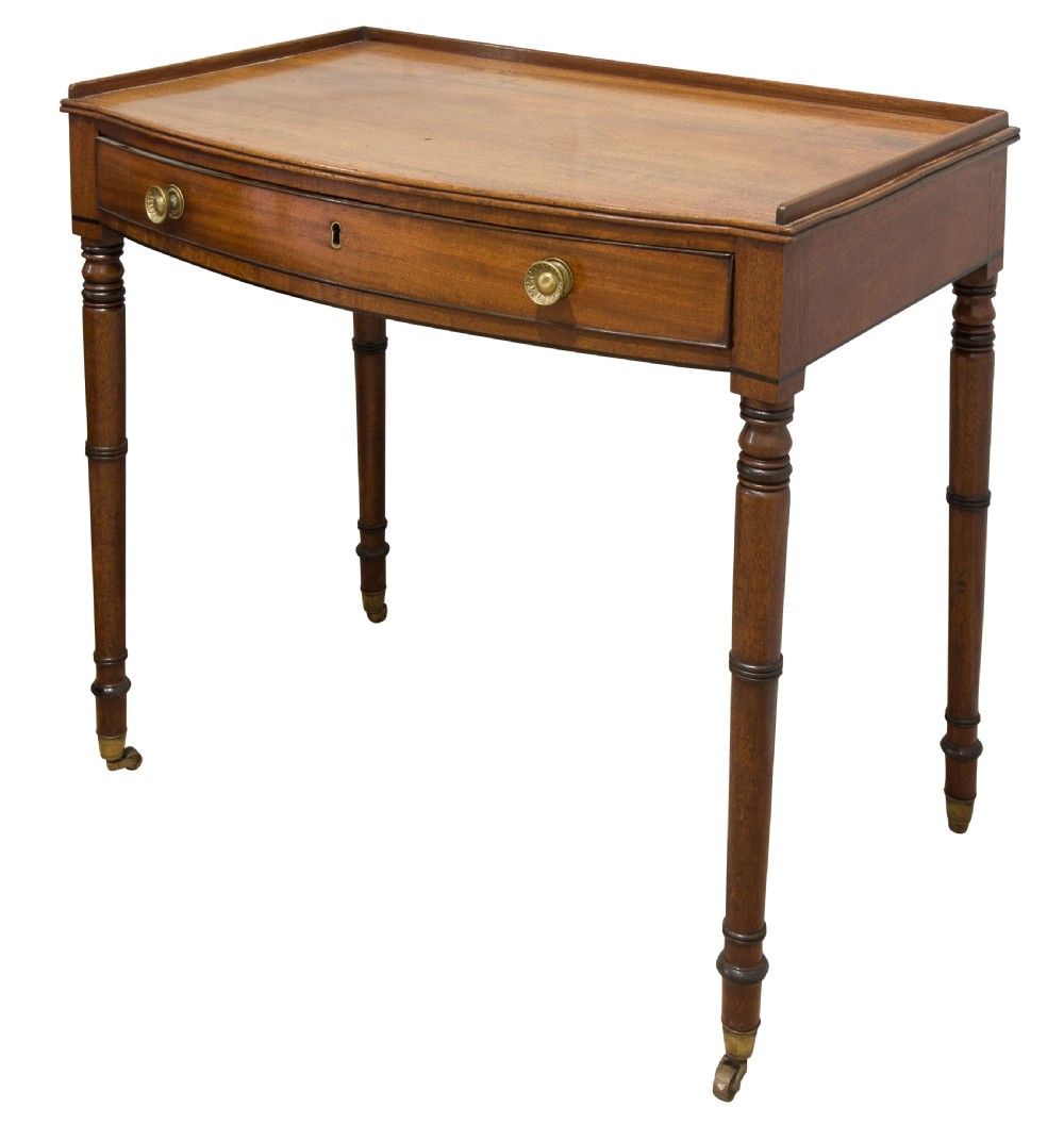 A George III mahogany bow fronted side table