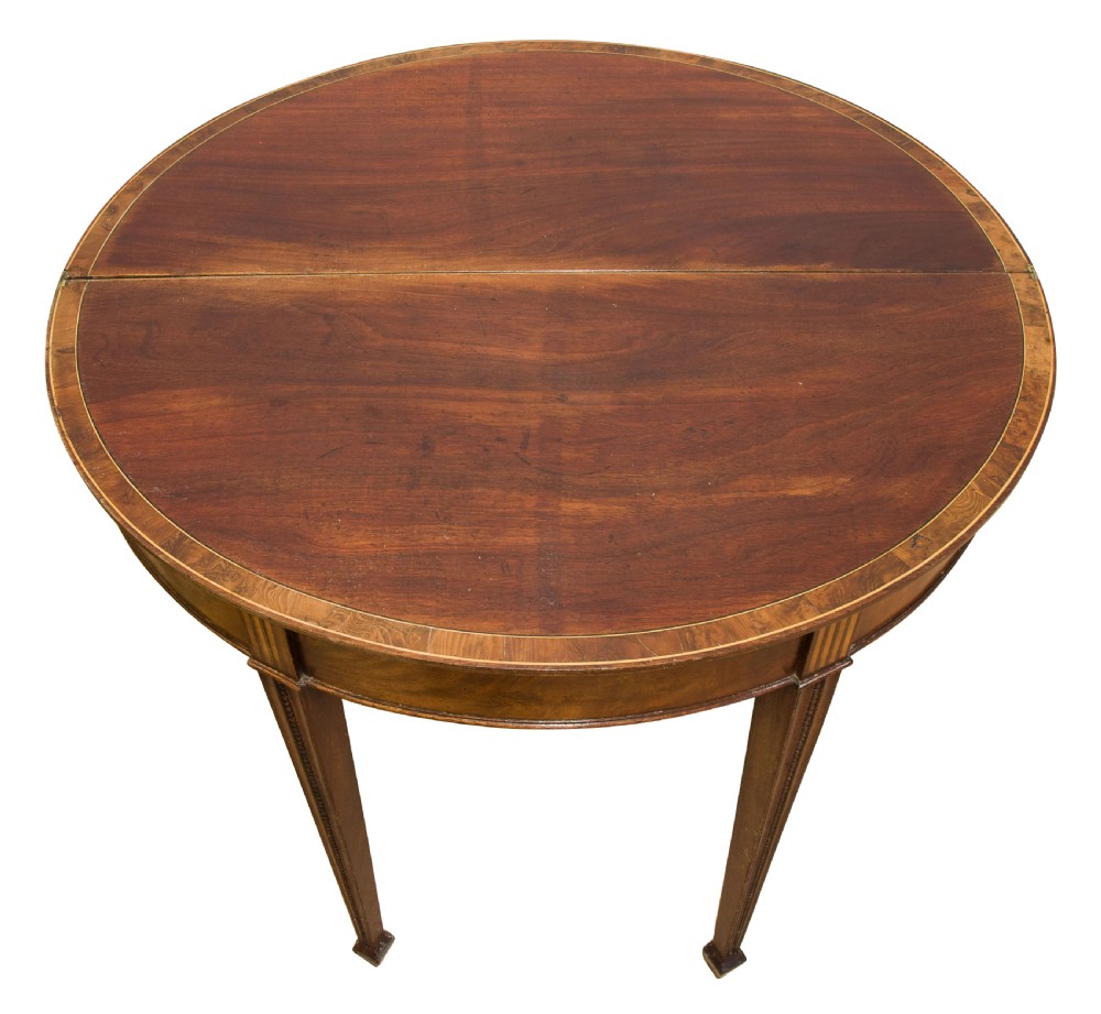 George III mahogany demi lune tea table View V