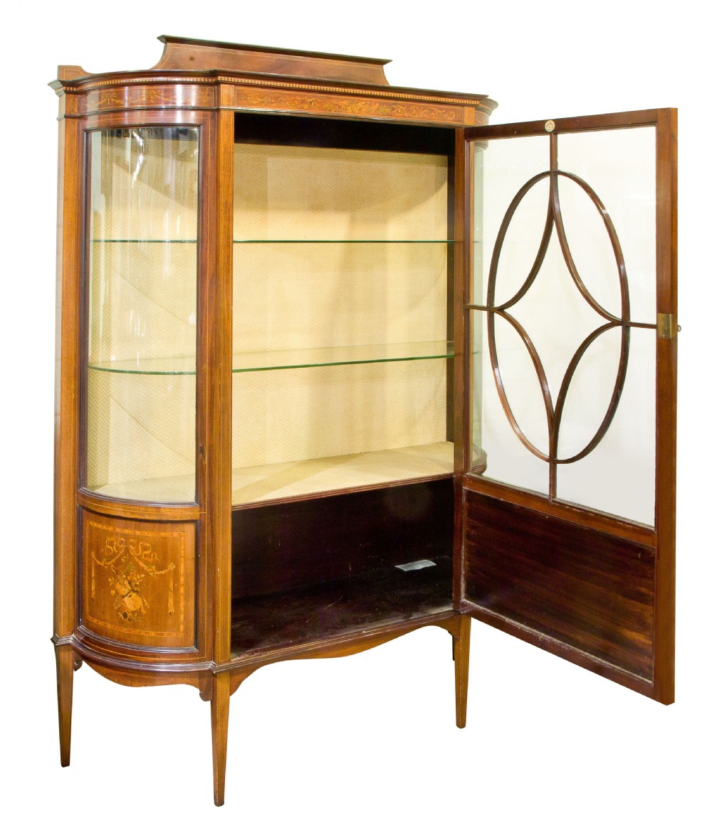 A fine 19thc mahogany bow ended display cabinet View II
