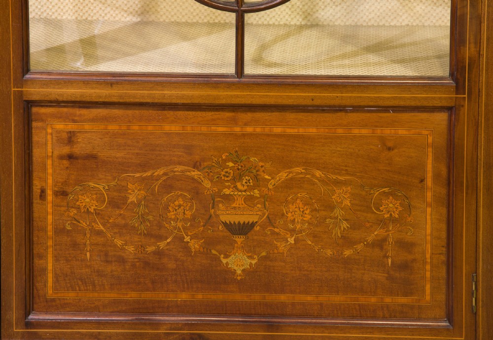 A fine 19thc mahogany bow ended display cabinet View V