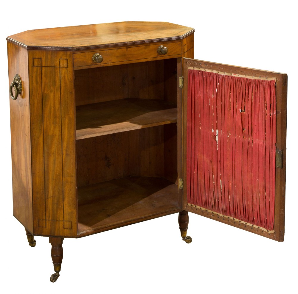 Late Georgian mahogany cabinet of unusual hexagonal form View II