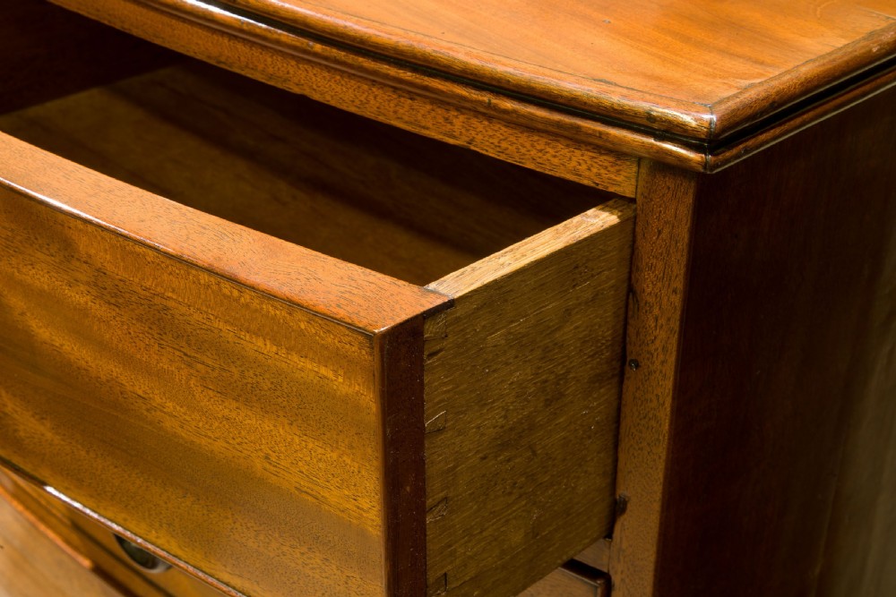 A Tall Mahogany Bow Front Chest View VII
