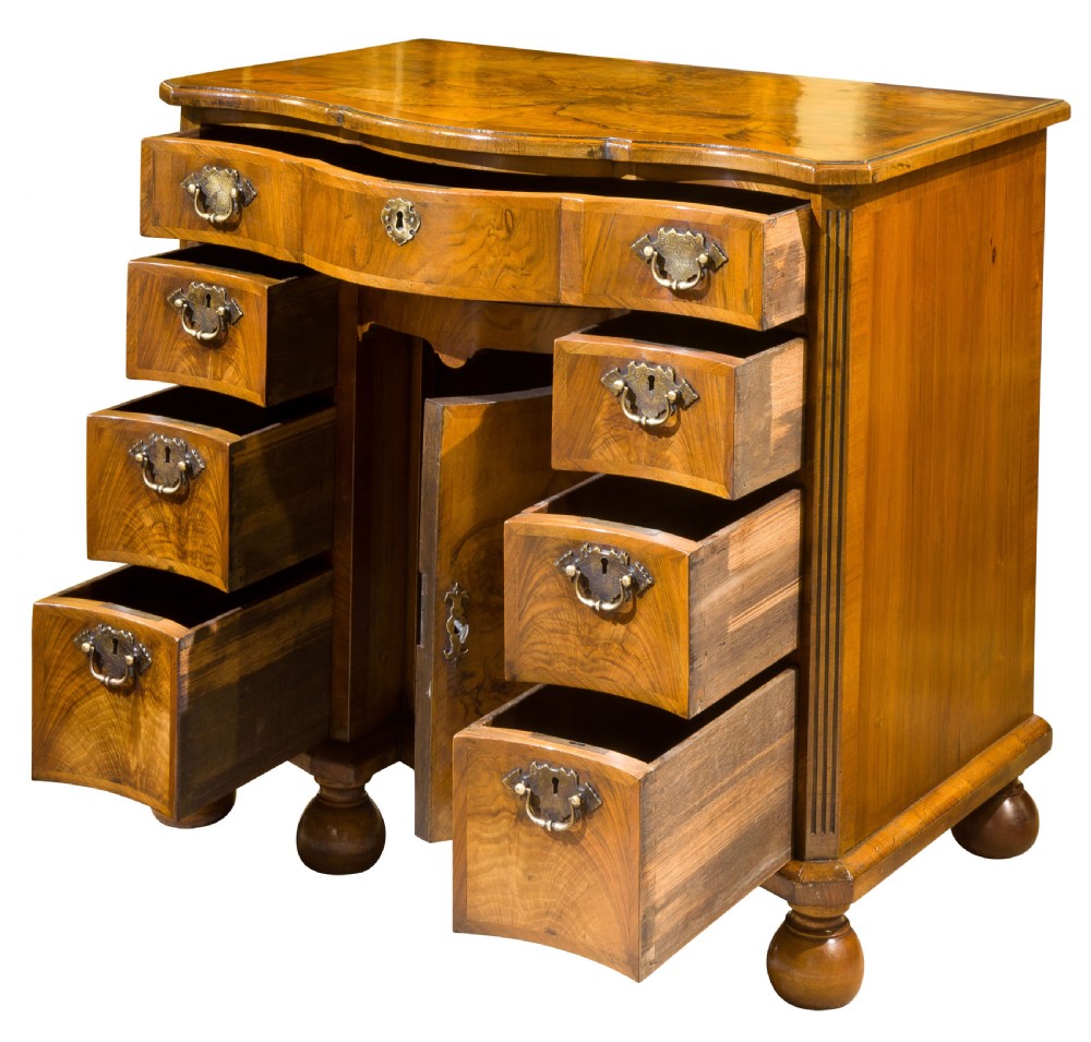 A Burr and Figured Walnut Serpentine Fronted Kneehole Desk View II