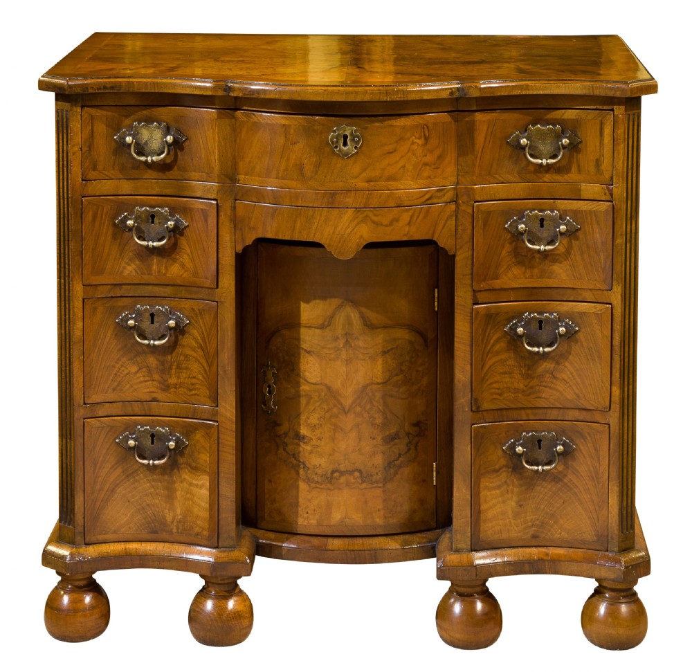 A Burr and Figured Walnut Serpentine Fronted Kneehole Desk View III