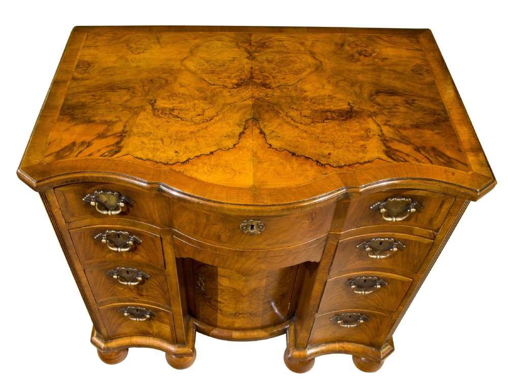 A Burr and Figured Walnut Serpentine Fronted Kneehole Desk View V