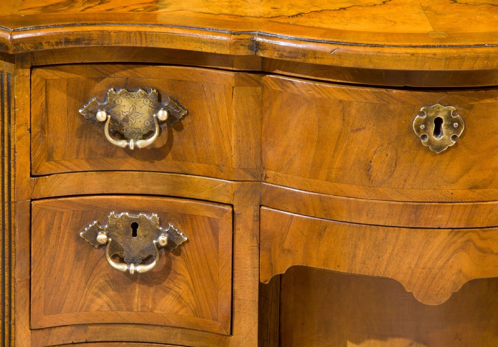A Burr and Figured Walnut Serpentine Fronted Kneehole Desk View VI