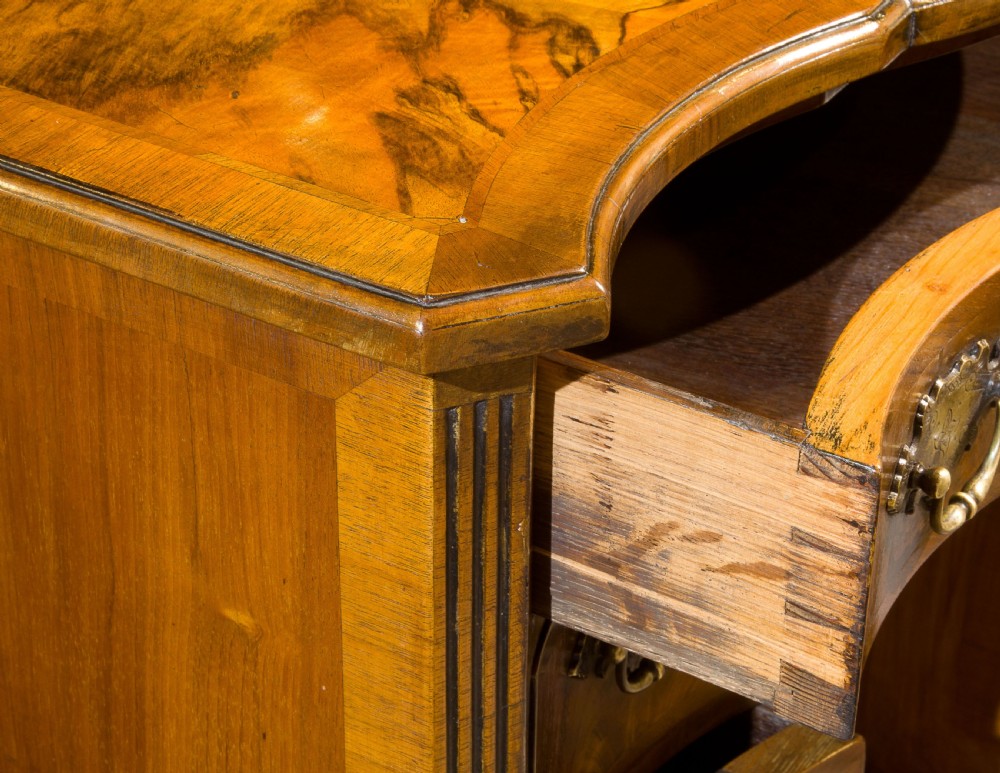 A Burr and Figured Walnut Serpentine Fronted Kneehole Desk View VII
