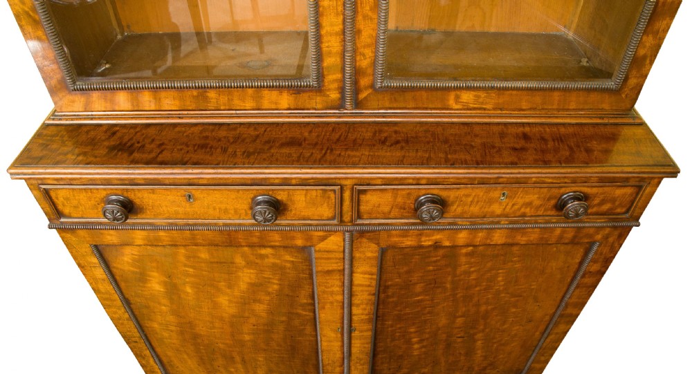 A very fine Regency figured mahogany 2 part bookcase View V
