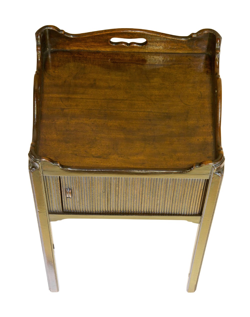 A George III dark mahogany night table featuring a tray top with pierced side handles and a sliding tambour front door raised on four straight square legs. View VI