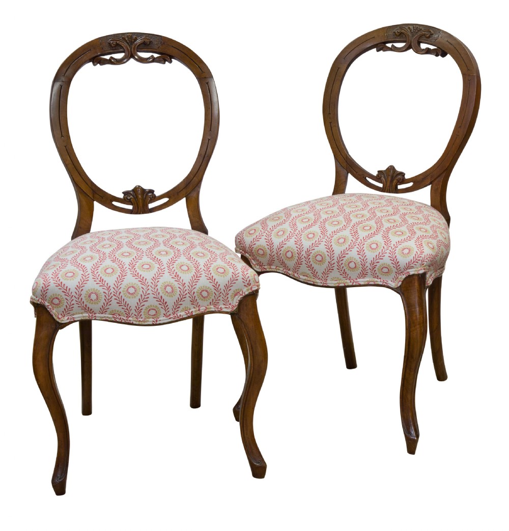 Pair of Victorian walnut balloon back chairs