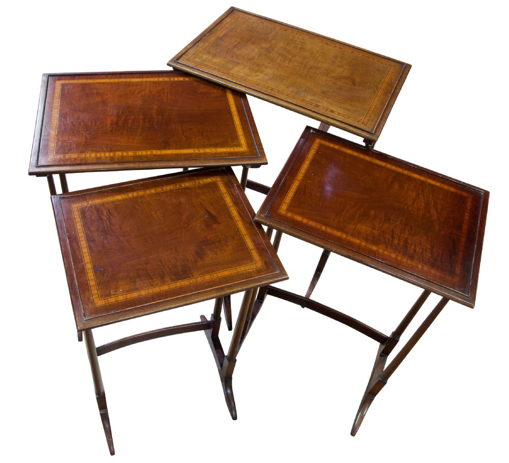 Nest of 4 mahogany tables View III