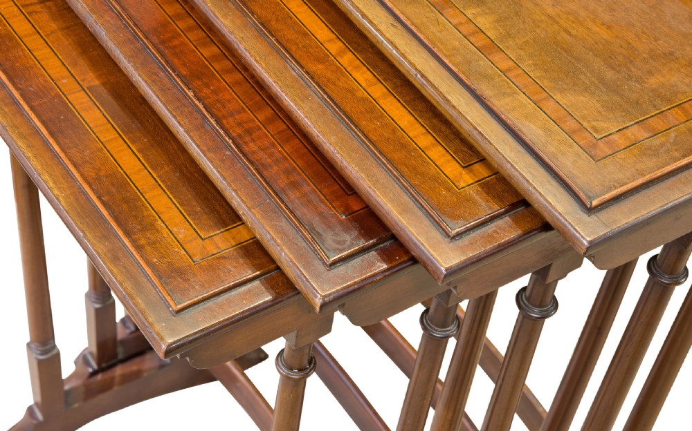 Nest of 4 mahogany tables View V
