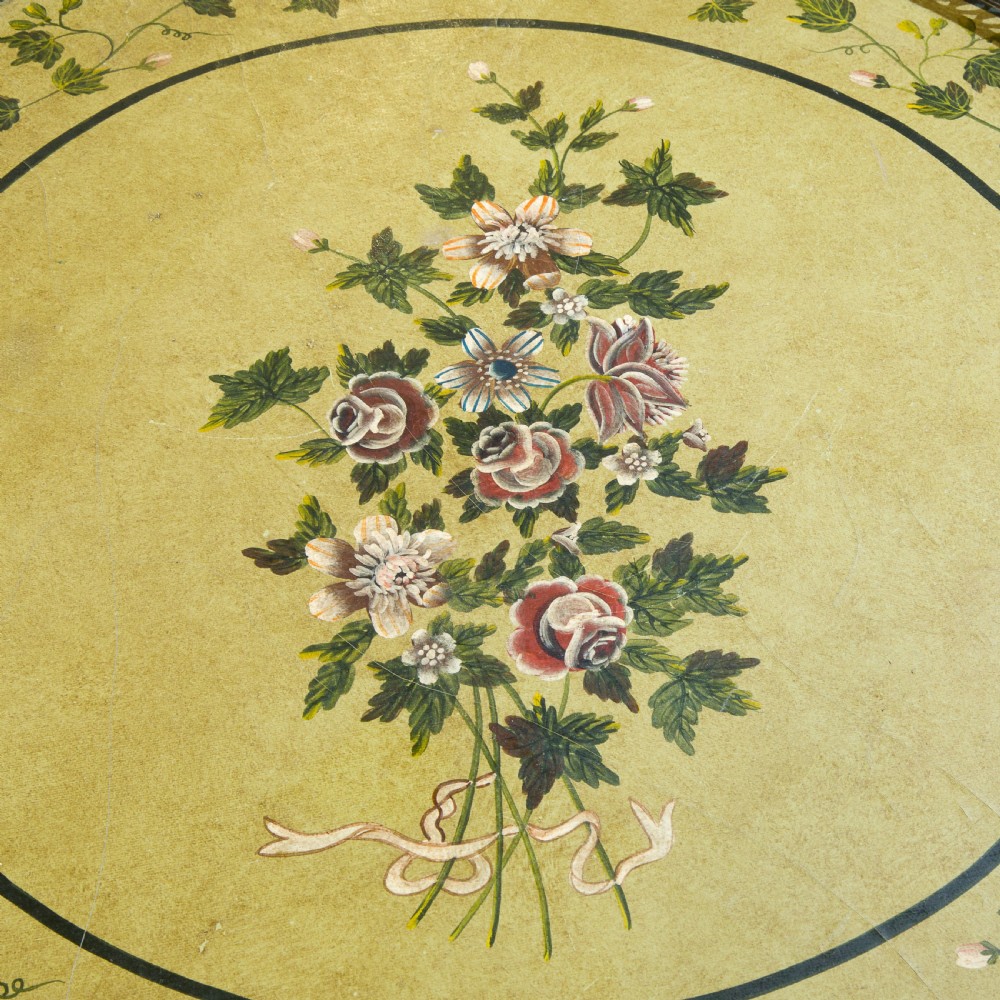 Circular painted topped table View V