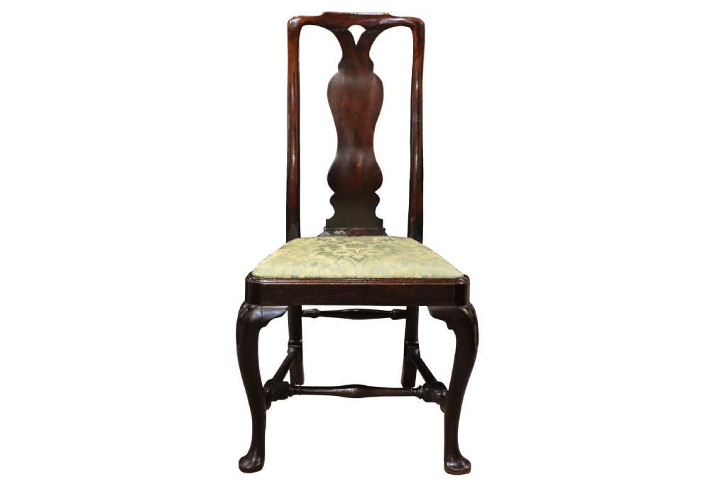 A pair of George I style walnut side chairs featuring high carved backrests with vase splats, cabriole front legs, and green pattern upholstered seats. View III