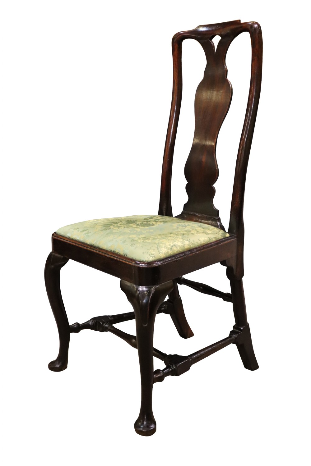A pair of George I style walnut side chairs featuring high carved backrests with vase splats, cabriole front legs, and green pattern upholstered seats. View IV