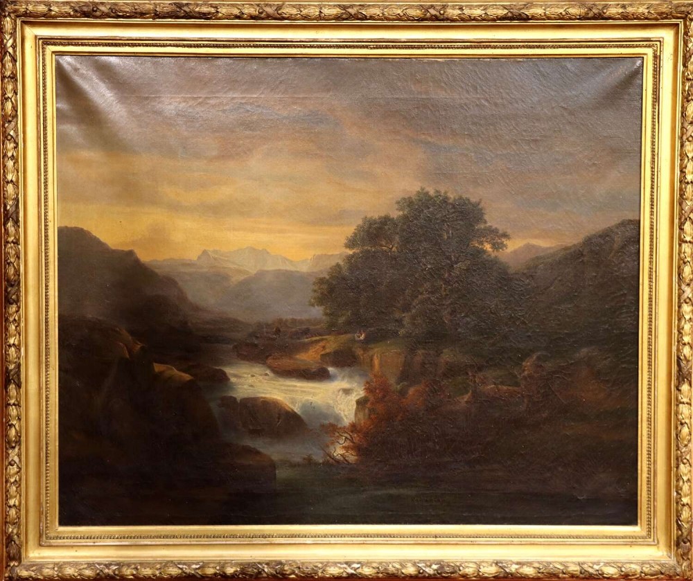 A 19th-century landscape oil painting depicting a rushing river, mature trees, and distant mountains enclosed in an ornate gilded frame.