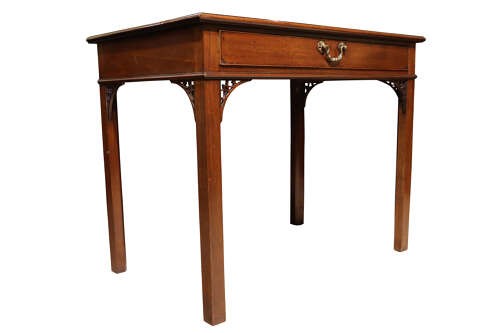 A Georgian mahogany side table featuring a single long drawer with a brass handle, straight square legs, and pierced Gothic corner brackets. View V