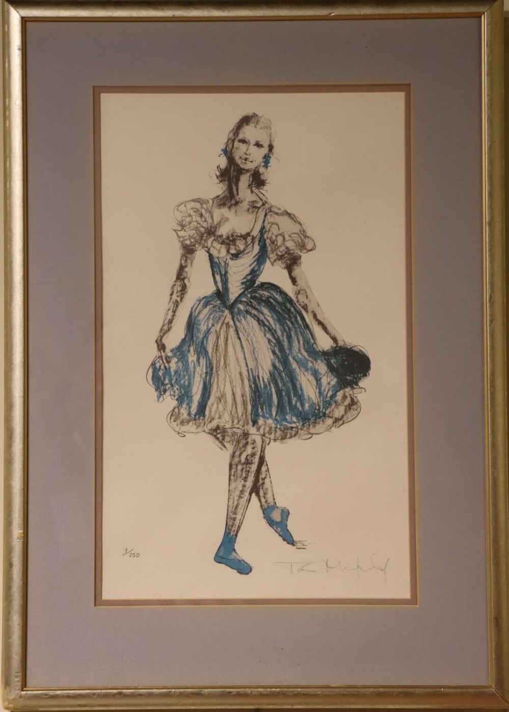 A framed limited edition print depicting a ballet dancer in a blue and cream dress inside a gilded frame.