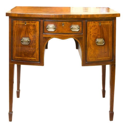 A small George III mahogany bow-front sideboard featuring purpleheart crossbanding, brass handles, an arched central kneehole, and tapered legs. View III