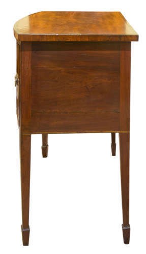 A small George III mahogany bow-front sideboard featuring purpleheart crossbanding, brass handles, an arched central kneehole, and tapered legs. View V
