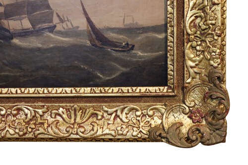 An early Victorian oil painting on canvas depicting sailing ships navigating rough ocean seas, housed in a wide carved gilt frame. View IV