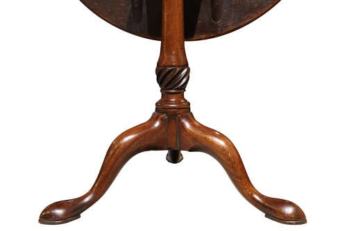 A circular Georgian mahogany tilt-top wine table featuring a turned central column with spiral detail and three cabriole legs. View V