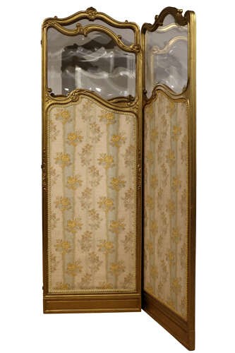 A three-panel French giltwood folding screen featuring shaped bevelled glass top sections and floral-patterned beige silk lower panels. View V