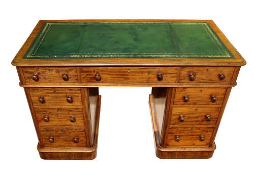 A Victorian mahogany pedestal desk with nine drawers featuring turned wooden handles and a solid plinth base. View III