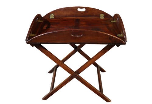A William IV mahogany butlers tray with carved cutout handles situated on an X-frame folding wooden stand. View III