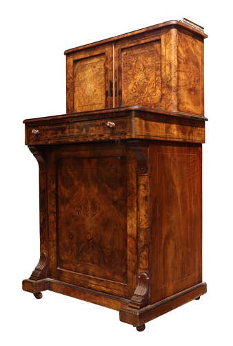 A Victorian burr walnut bureau de dame featuring intricate brass inlay, a top cabinet with twin doors, a full-width drawer, and a lower cupboard set on castors. View IV