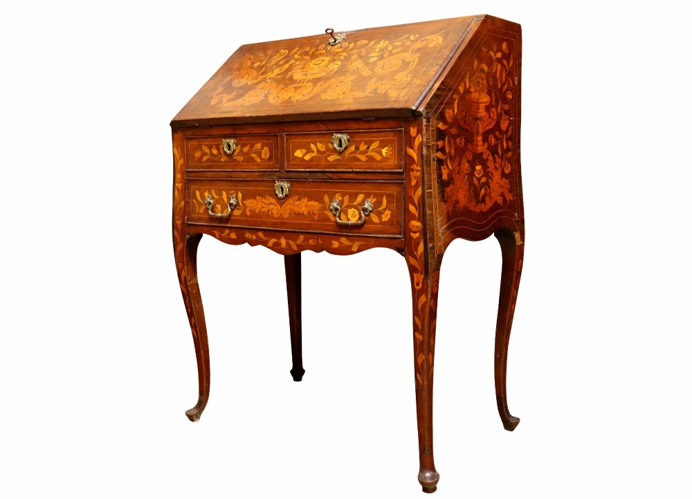 An 18th-century Dutch bureau featuring intricate floral wood marquetry, a sloped fall front, drawers with brass handles, and cabriole legs. View IV