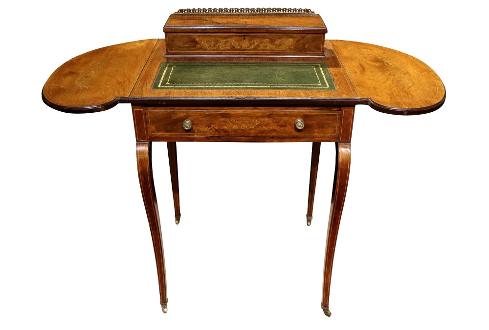An Edwardian rosewood writing table featuring a green leather writing surface, satinwood floral marquetry inlay, drop-leaf side panels, and a superstructure with brass gallery railing. View V