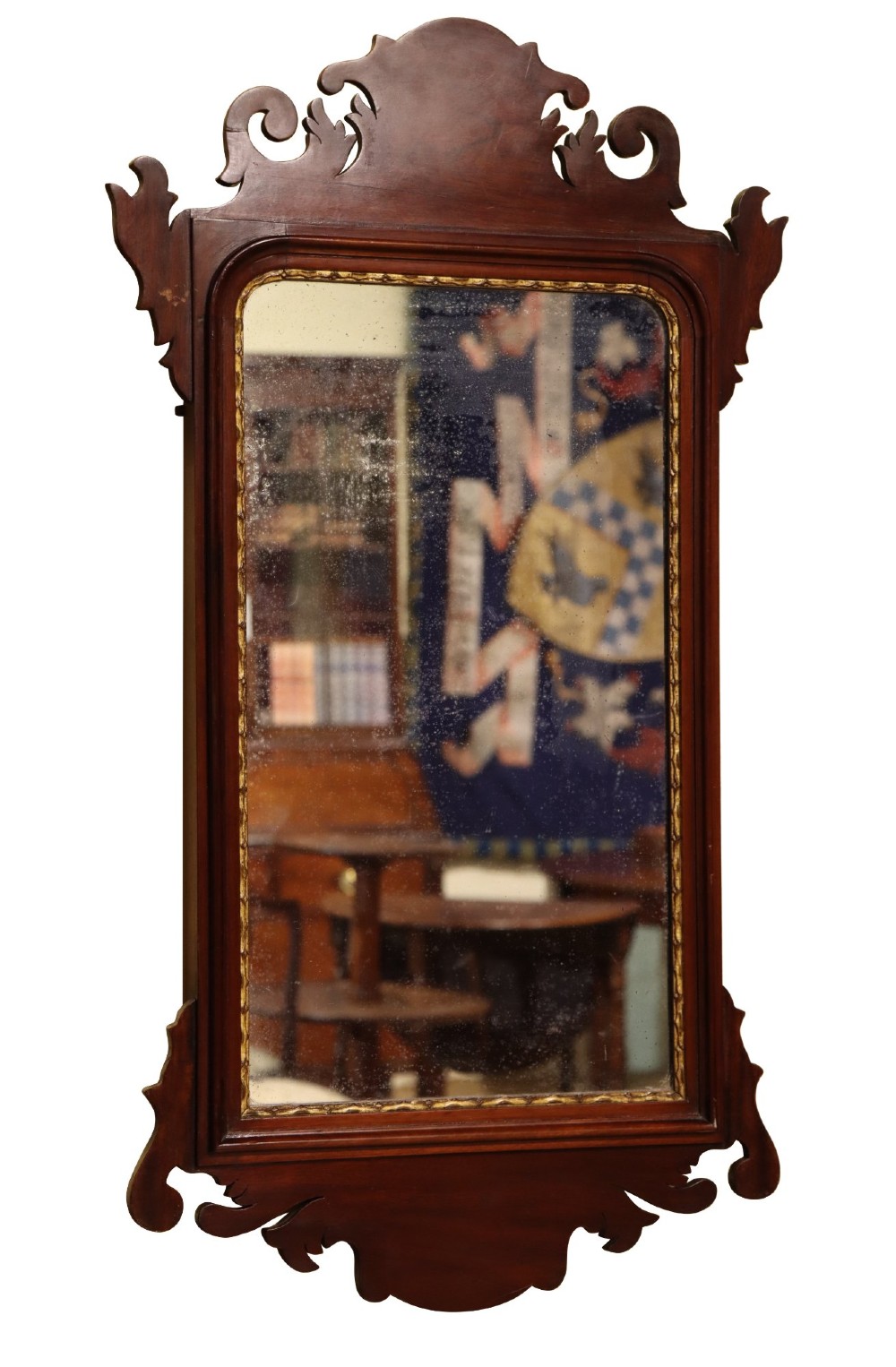 A Victorian Chippendale style mahogany wall mirror featuring decorative fretwork scroll cresting and a gilded inner slip border. View II