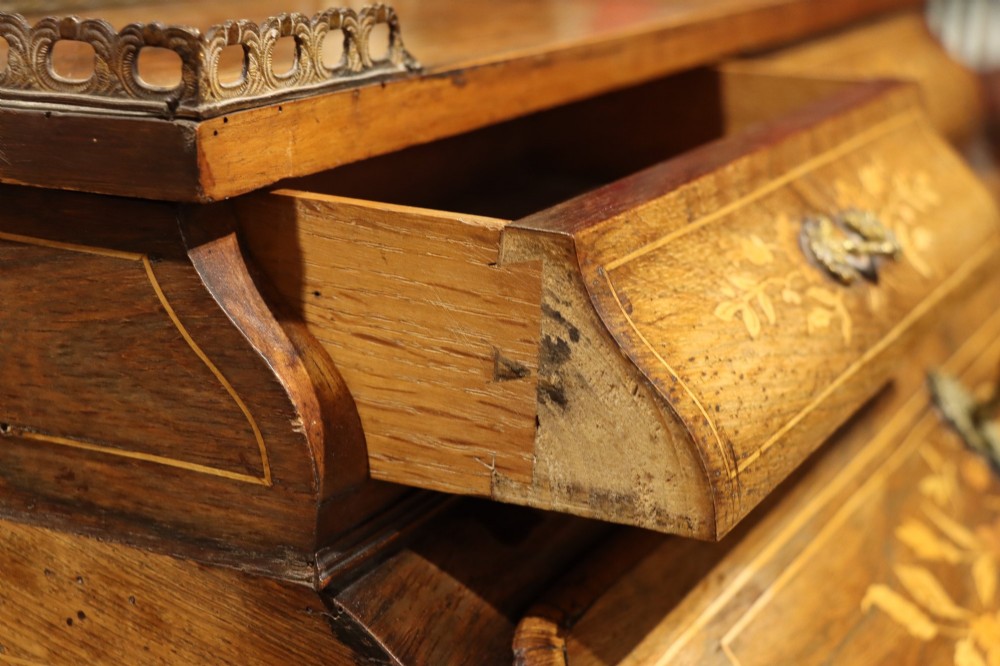 A 19th-century French Louis XV style bonheur-du-jour writing desk featuring floral marquetry inlay, slender cabriole legs, a slant-front writing slope, and brass mounts. View VII