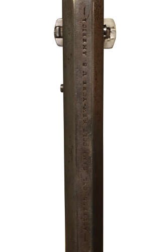 An antique Colt Model 1851 Navy percussion revolver featuring a grey steel frame, an octagonal barrel, a six-shot cylinder, and a dark walnut grip. View VI