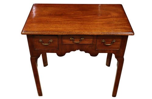 A George II mahogany lowboy table featuring three drawers with brass swan-neck handles and a shaped lower apron. View III