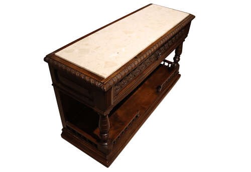 A French Henri II style dark oak enfilade with a carved frieze drawer, turned column supports, and an open lower shelf framed by a spindle rail. View V